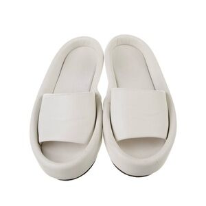 KHAITE Cream Slide Sandals